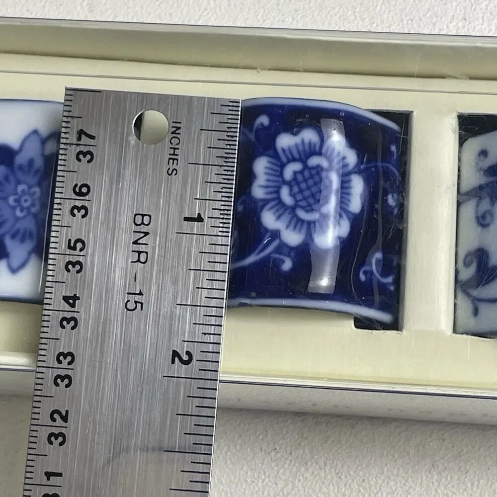 New In Pkg Set of 4 Pier 1 Mandarin Blue And White napkin rings